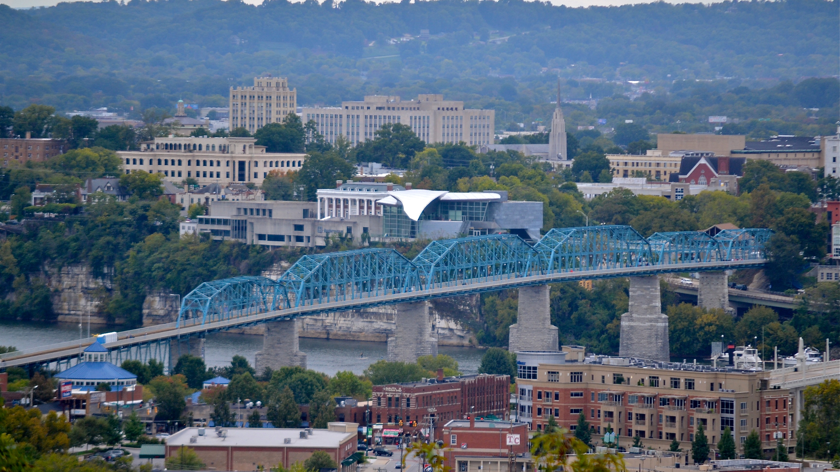 Chattanooga is a city located along the Tennessee River near the southeastern corner of the U.S. state of Tennessee. With an estimated population of 179,139 in 2017,[8] it is the fourth-largest city in Tennessee and one of the two principal cities of East Tennessee, along with Knoxville. Served by multiple railroads and Interstate highways, Chattanooga is a transit hub. Chattanooga lies 120 miles (190 km) northwest of Atlanta, Georgia, 120 miles (190 km) southwest of Knoxville, Tennessee, 135 miles (217 km) southeast of Nashville, Tennessee, 120 miles (190 km) northeast of Huntsville, Alabama, and 148 miles (238 km) northeast of Birmingham, Alabama.